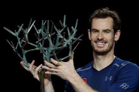 Tennis - Paris Masters tennis tournament men's singles final - Andy Murray of Britain v John Isner of the U.S. - Paris, France - 6/11/2016 - Andy Murray poses for pictures after winning. REUTERS/Gonzalo Fuentes