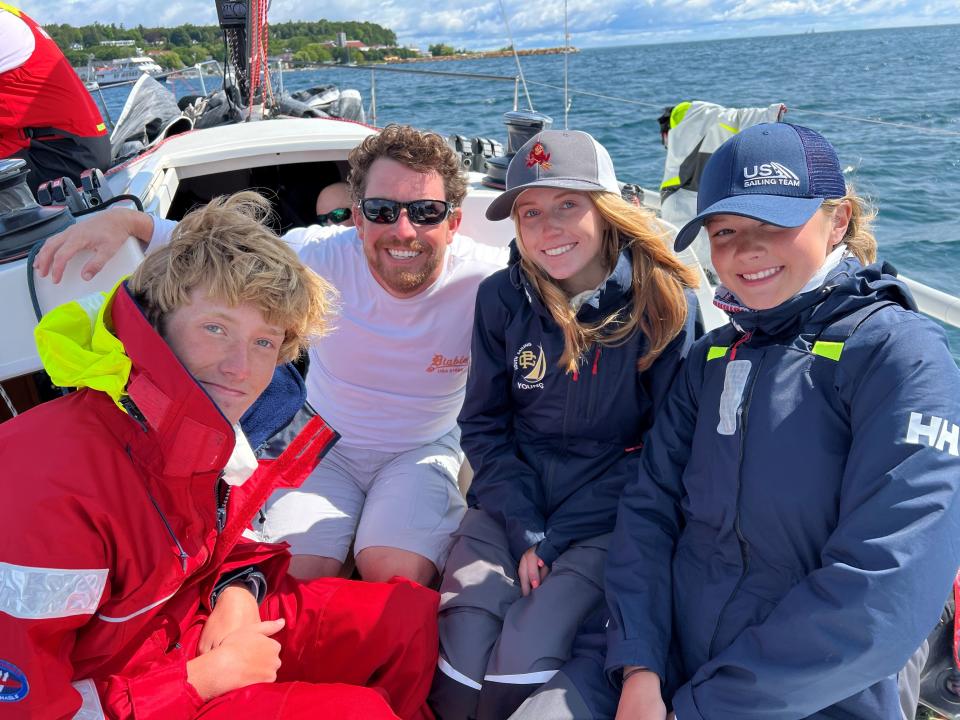 The crew of Diablo pictured after the finish of the Bayview Mackinac race on July 17, 2023: Alex Young, of Grosse Pointe, left,  Grant Lockhart, of Grosse Pointe Park, Evelyn Young, of Grosse Pointe, and Addie Kimmel, of Grosse Pointe Farms.