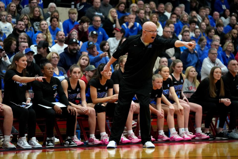 Springboro Panthers head coach Mike Holweger makes an argument to an official in the first half of an OHSAA Division I girls regional final game against the Mount Notre Dame Cougars, Saturday, March 9, 2024, at Lakota West High School in West Chester Township, Ohio.