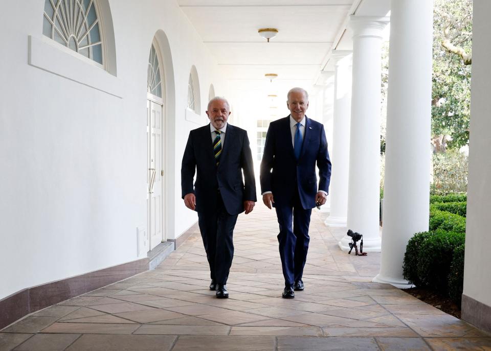 February 10, 2023: US President Joe Biden and Brazilian President Luiz Inacio Lula da Silva walk together along the Rose Garden colonnade at the White House in Washington, DC.