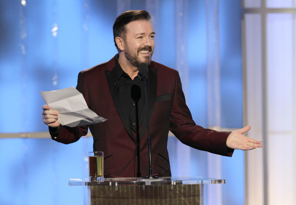 BEVERLY HILLS, CA - JANUARY 15: In this handout photo provided by NBC, host Ricky Gervais performs onstage during the 69th Annual Golden Globe Awards at the Beverly Hilton International Ballroom on January 15, 2012 in Beverly Hills, California. (Photo by Paul Drinkwater/NBC via Getty Images)