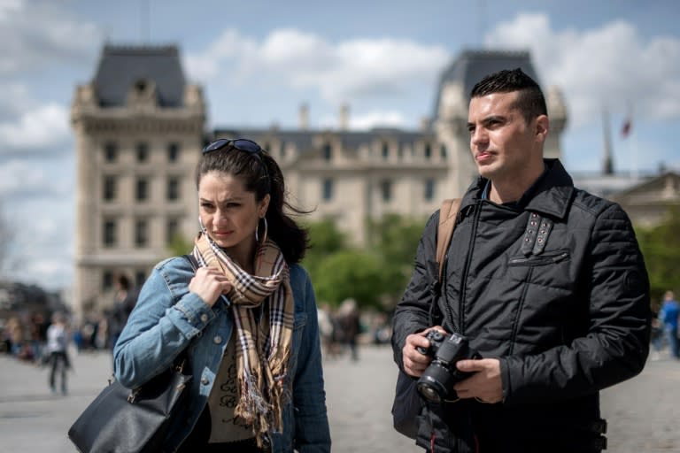 Afghan actress Marina Golbahari and her husband Noor pose for a picture in Paris on April 14, 2016