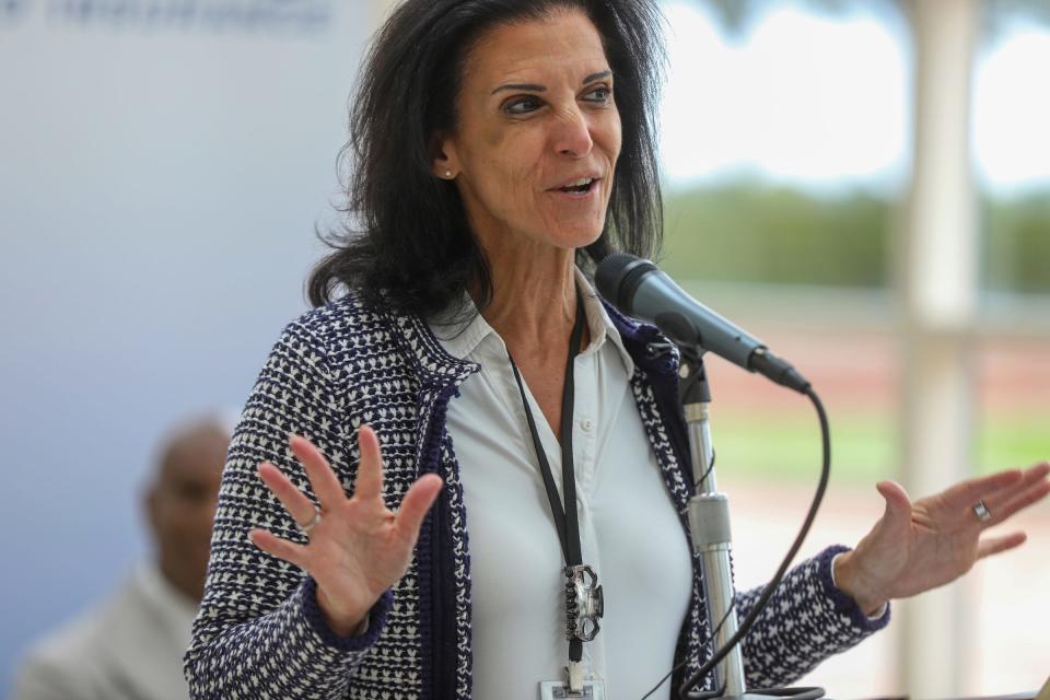 Bedrock Chief Operating Officer Ivy Greaner speaks at the ribbon-cutting ceremony for the new CURE Auto Insurance offices near downtown Detroit on Wednesday, Aug. 30, 2023. After just over two years in Michigan, CURE says it now insures about 75,000 vehicles in the state, 58% of them belonging to Detroit residents.