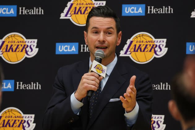 JJ Redick fields questions from reporters at his introductory press conference. 