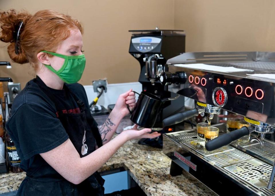 Morgan Barrientos, director of operations at Caffe Vignette in Warner Robins, makes a Cocomel Macchiato.