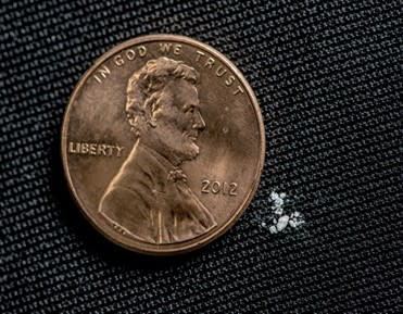 Image from the DEA of what 2 mg, a potentially lethal dose of fentanyl, looks like.