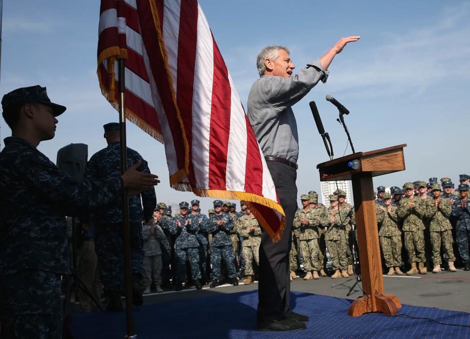 U.S. Secretary of Defense Chuck Hagel speaks to military servicemembers aboard the USS Ponce in Manama