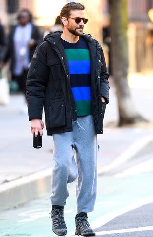 <p>Diamond/BACKGRID</p> Bradley Cooper wearing a Guest in Residence sweater in N.Y.C.