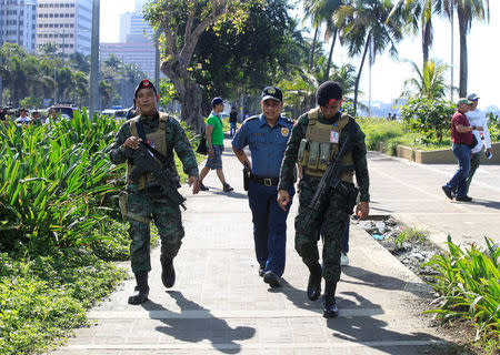 Members of the Philippine National Police (PNP) Special Action Force patrol after an Improvised Explosive Device (IED) was found near the U.S Embassy in metro Manila, Philippines November 28, 2016. REUTERS/Romeo Ranoco