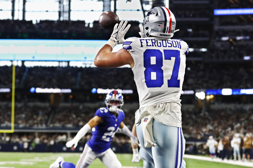 Dallas Cowboys tight end Jake Ferguson (87) catches a touchdown pass in the first half of an NFL football game against the New York Giants, Sunday, Nov. 12, 2023, in Arlington, Texas. (AP Photo/Roger Steinman)