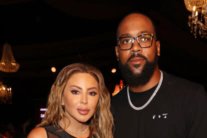 Larsa Pippen and Marcus Jordan at an event.