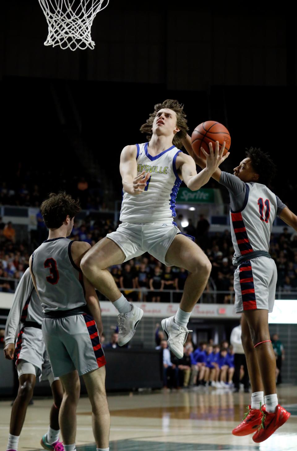 Alex Bobb goes in for a layup during Maysville's Division II regional final against Columbus Hartley on Thursday at the Ohio COnvocation Center.