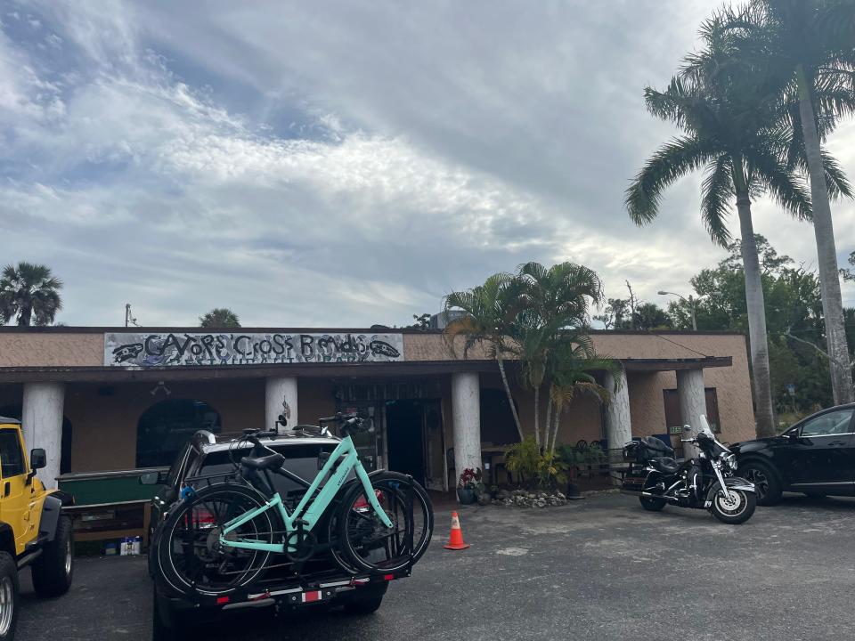 The land that Gator's Crossroads bar and restaurant, Texaco gas station and Service Auto Repair on Tamiami Trail and San Marco Road are for sale for $5 million.