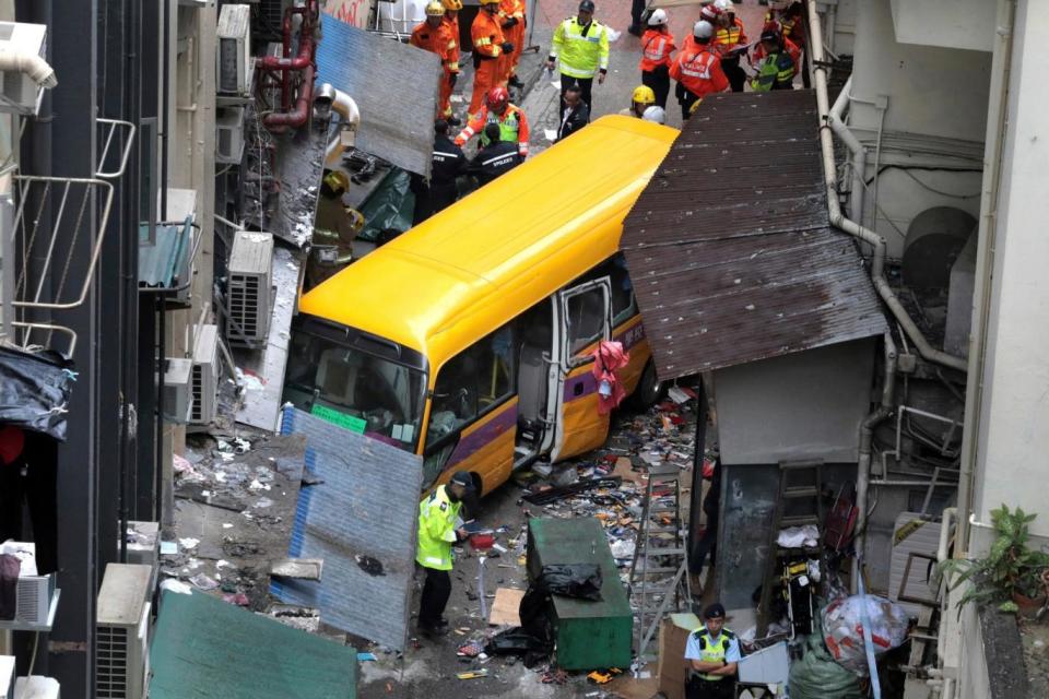 Luckily no children were on-board the bus when it crashed in North Point (AP)