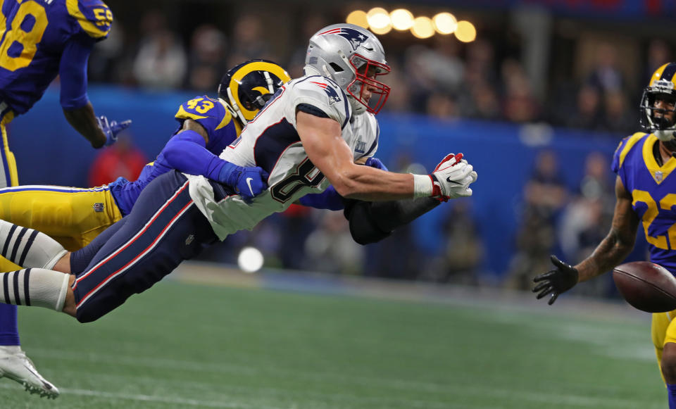 <p>Rob Gronkowski dives but can’t make the catch on a pass from quarterback Tom Brady (not pictured). The Rams John Johnson III, a Boston College product defends. Los Angeles took over on downs. (Jim Davis /Globe Staff) </p>