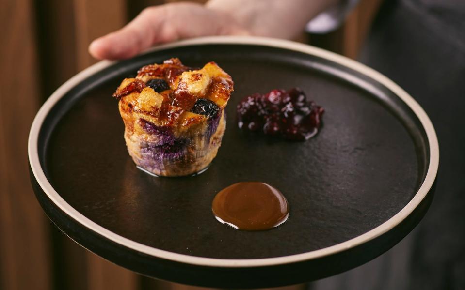 Desserts on the menu include bread and butter pudding with blueberries and caramel