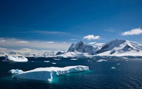 A tabular iceberg floating within Paradise Harbour, Antarctica - Credit: iStock