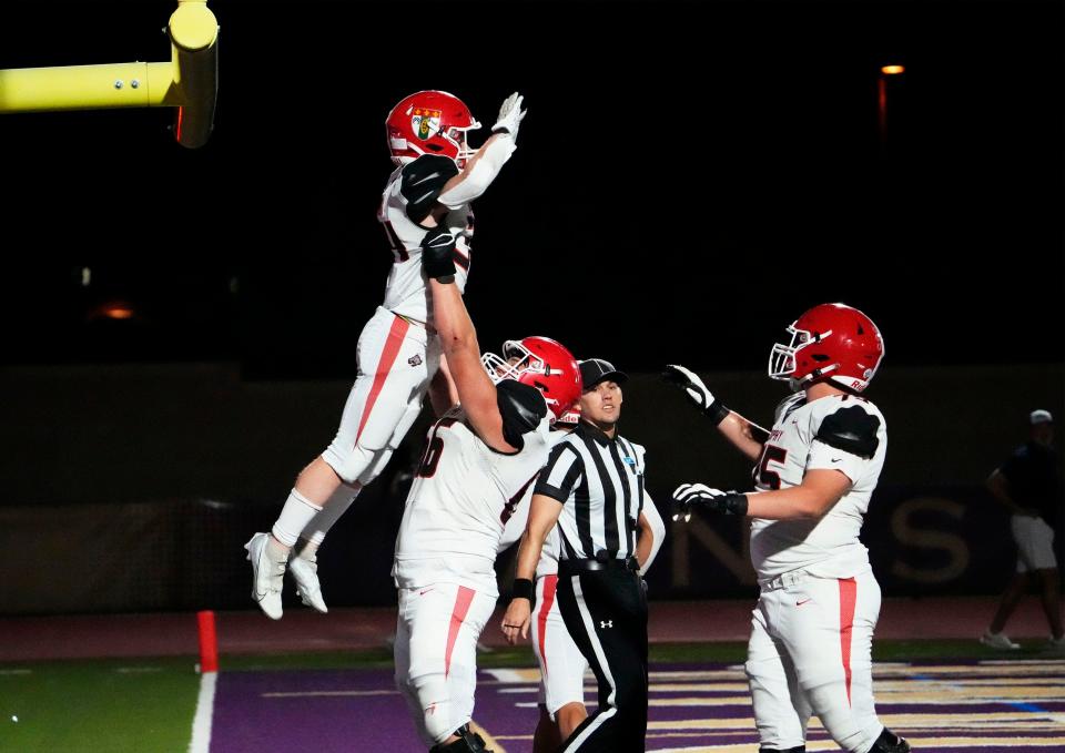 Brophy Prep Broncos running back Harrison Chambers (34) celebrates his touchdown against the Notre Dame Prep Saints during a game played at Notre Dame Prep in Scottsdale on Sept. 22, 2023.