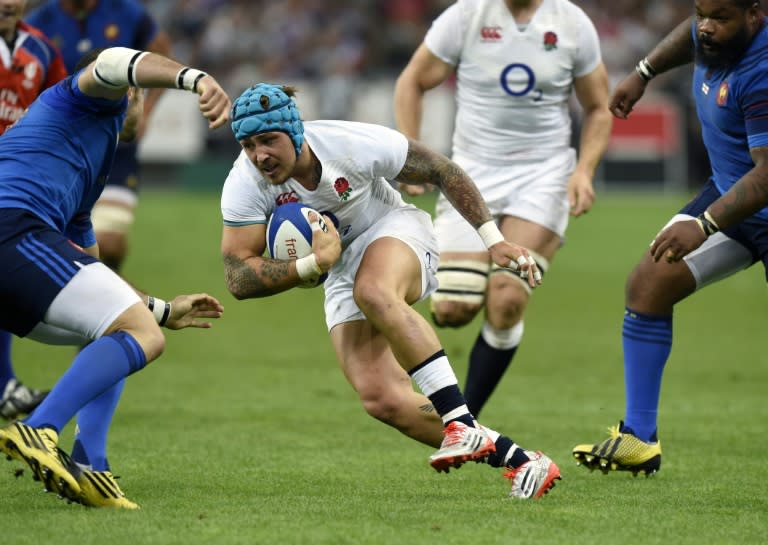 England's Jack Nowell runs during a Rugby World Cup warm-up match against France at the Stade de France in Saint-Denis on August 22, 2015