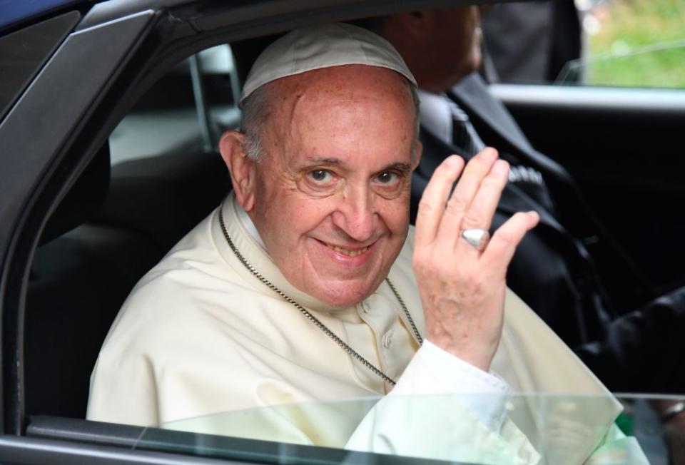 A wave from the Pope