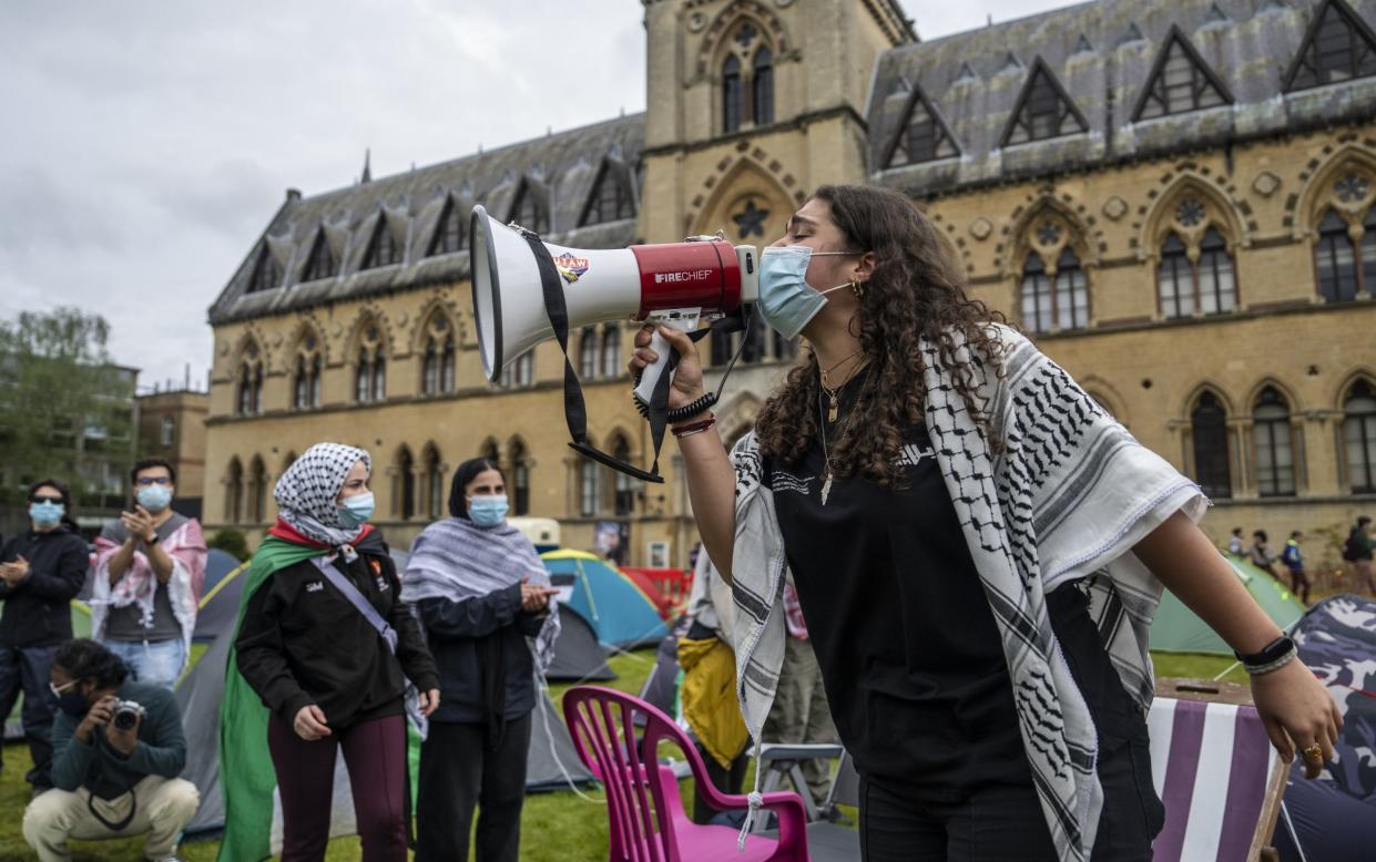 Pro-Palestine student activists take part in an encampment in front of the Oxford University Museum of Natural History