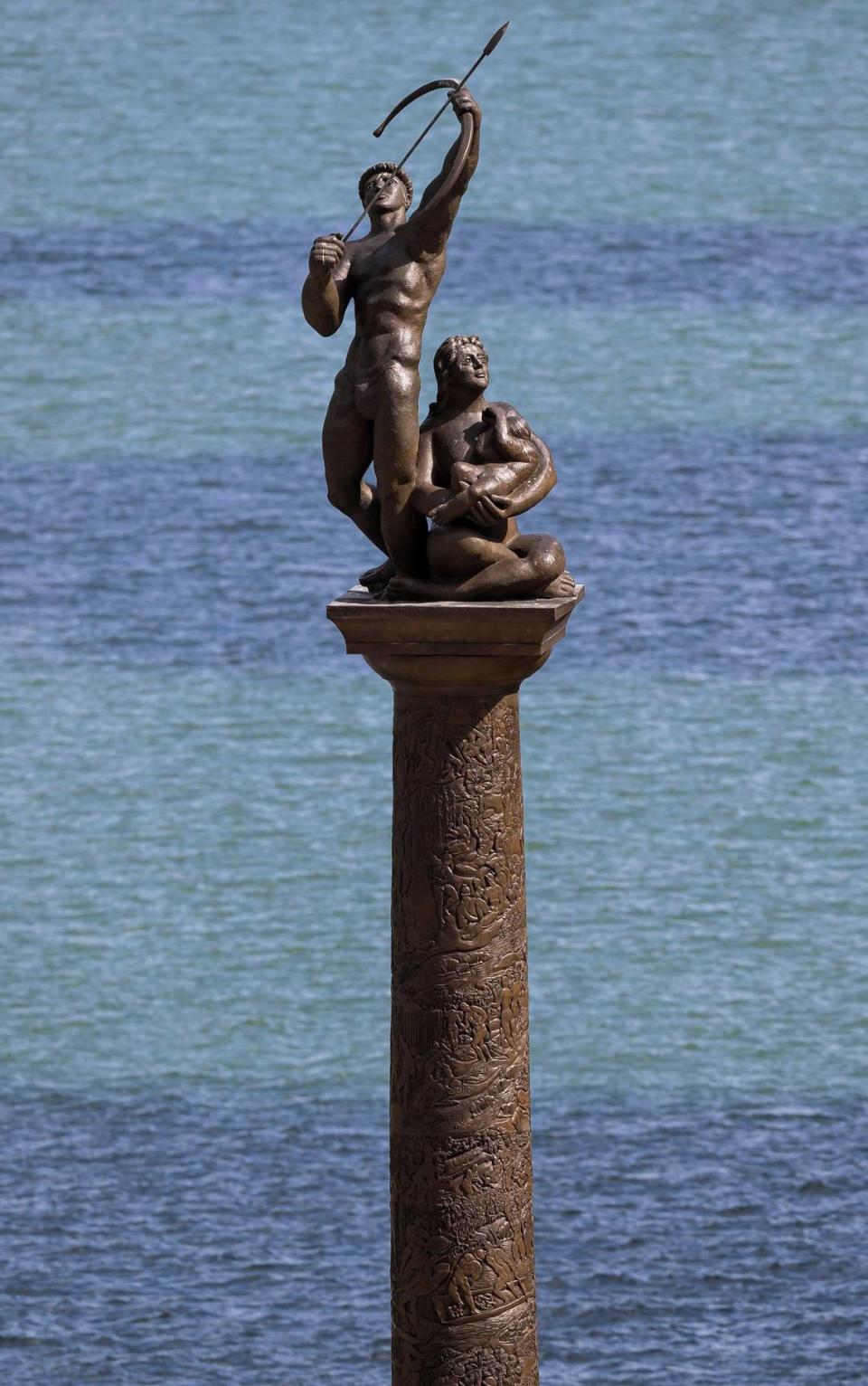 A view of the Tequesta bronze statue on Monday, Jan. 30, 2023, in Miami. Artifacts going back 7,000 years have been found at a nearby construction site, along with postholes, gravesites, human remains and other evidence of substantial settlement by the Tequesta Native American tribe.