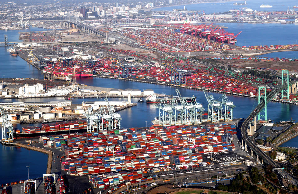 In an aerial view, shipping containers and container ships are seen at the ports of Long Beach and Los Angeles on September 20, 2021 near Los Angeles, California. (Mario Tama/Getty Images)