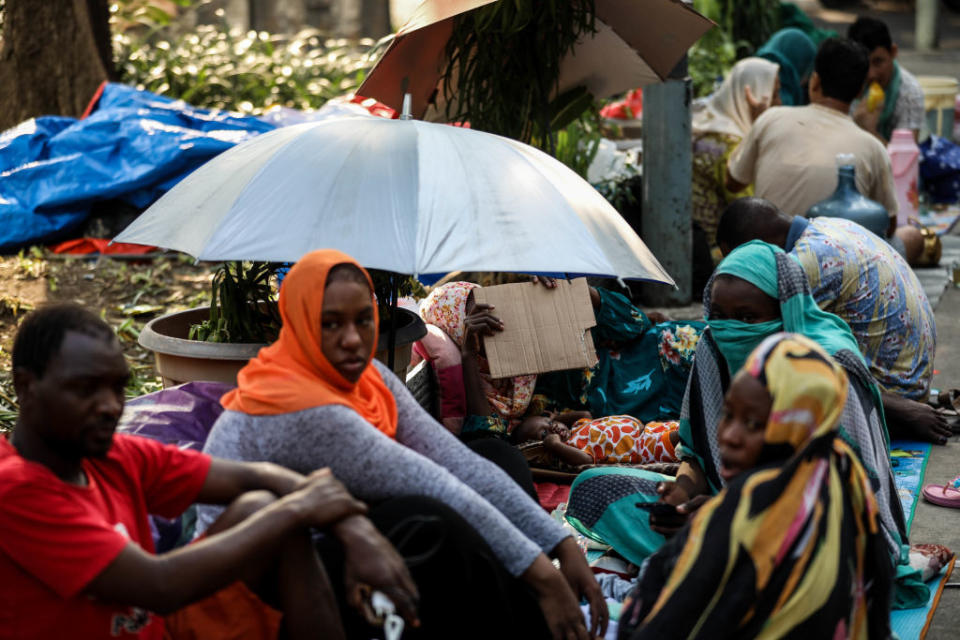 Sudanese refugee families living in tents near Jakarta's UNHCR headquarters to protest their resettlement delays in Jakarta, Indonesia, on July 6, 2019. Indonesia is home to about 14,000 refugees. Afghanistan, Sudan and Somalia are one of the biggest groups of refugees in Indonesia. Afghan Hazaras, who represent a significant number of arrivals to Indonesia, hoping to arrange onward passage to Australia, face many of the same difficulties that other asylum seekers and refugees do. However, they are a particularly vulnerable population given their religious minority status. (Photo by Andrew Gal/NurPhoto via Getty Images)