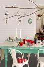 <p>Branch out from conventional tablescapes by using an extra-long tree limb as a platform for displaying ornaments. Simply knot lengths of twine around the branch and hang it from a row of five or six ceiling hooks. </p><p><a class="link " href="https://www.amazon.com/Sullivans-OR4676-Assorted-Ornament-Ornaments/dp/B00FD68JV8/ref=sr_1_3?tag=syn-yahoo-20&ascsubtag=%5Bartid%7C10050.g.644%5Bsrc%7Cyahoo-us" rel="nofollow noopener" target="_blank" data-ylk="slk:Shop Now;elm:context_link;itc:0;sec:content-canvas">Shop Now</a></p>