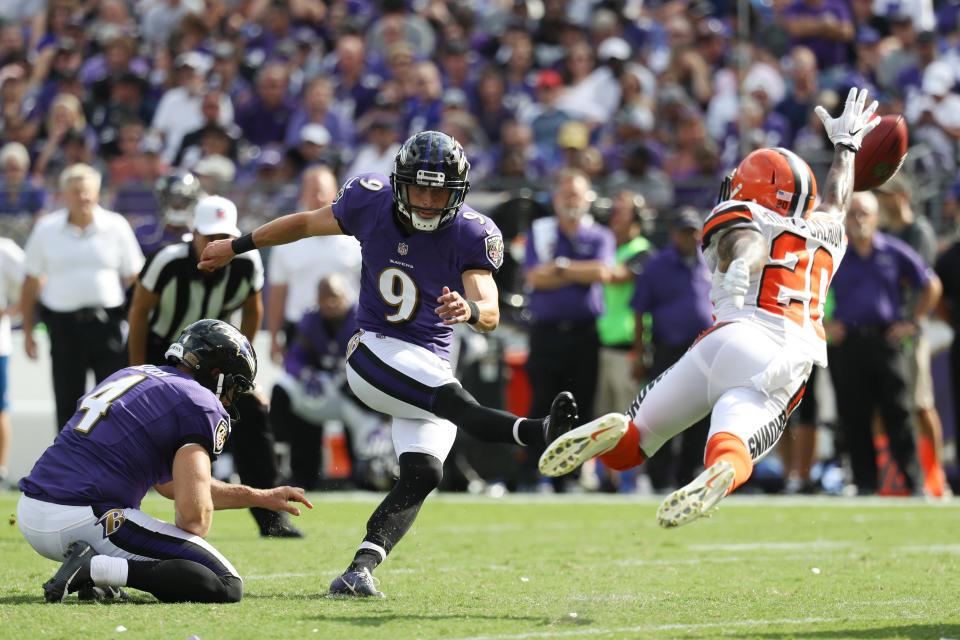 <p>Kicker Justin Tucker #9 of the Baltimore Ravens kicks as strong safety Briean Boddy-Calhoun #20 of the Cleveland Browns blocks him in the four quarter at M&T Bank Stadium on September 17, 2017 in Baltimore, Maryland. (Photo by Rob Carr /Getty Images) </p>