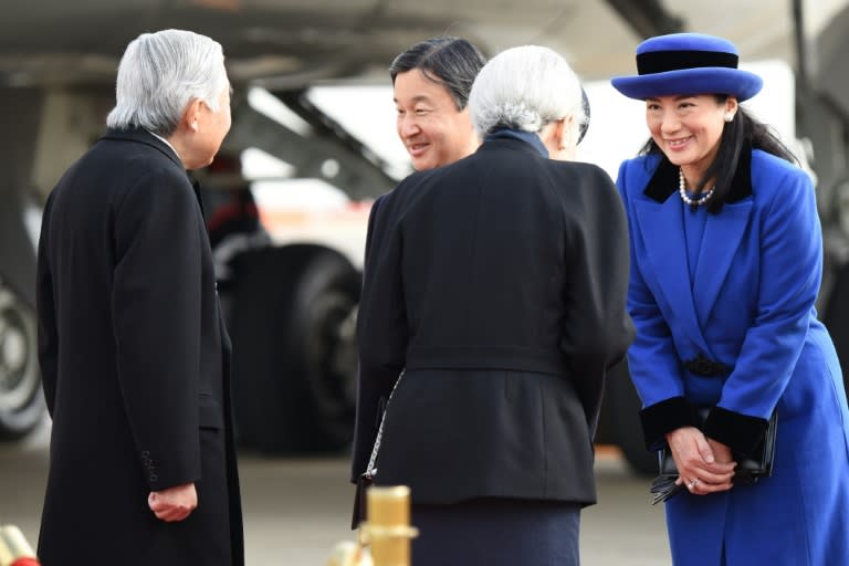 Japanese Crown Prince Naruhito (2nd L) and Crown Princess Masako (R) see off Emperor Akihito (L) and Empress Michiko (2nd R), ahead of their trip to the Philippines on January 26, 2016
