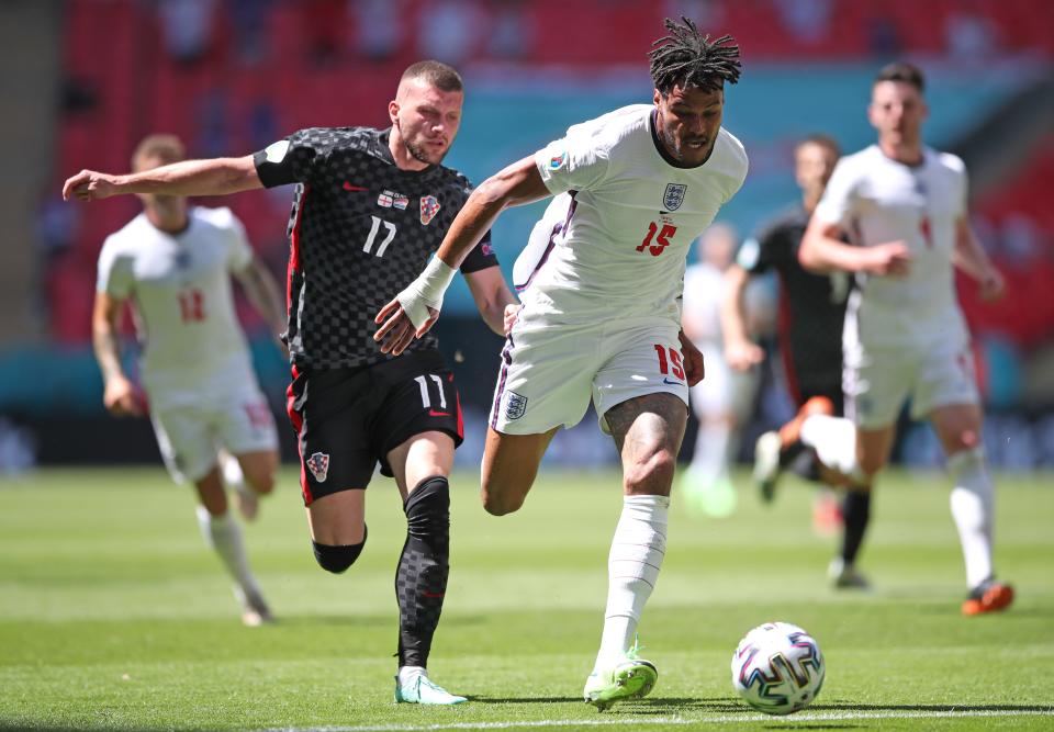 Tyrone Mings, right, shields the ball from Croatia’s Ante Rebic (Nick Potts/PA) (PA Wire)