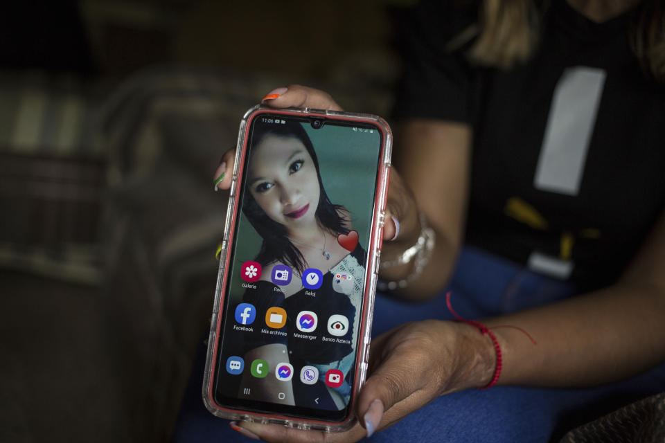 Esmeralda Millan shows a selfie taken on Dec. 1, 2018, the day before she was attacked with acid by her ex-partner, at her grandmother's home in the state of Puebla, Mexico, Tuesday, June 22, 2021. Millan’s attacker was arrested and jailed on charges of attempted femicide the same year of the attack, which burned her face’s entire right side, neck, chest and hands. (AP Photo/Ginnette Riquelme)