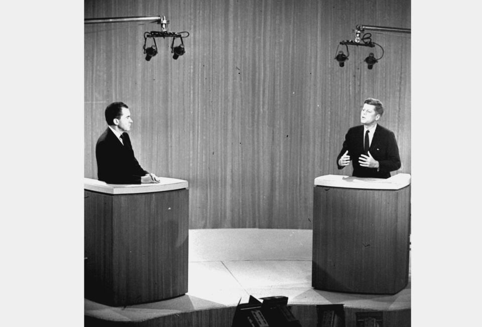 FILE - Sen. John F. Kennedy, right, speaks as Vice President Richard M. Nixon listens during the first ever televised presidential debate on Oct. 21, 1960, in New York. Presidential debates didn't become a recurring event until 1976 when the League of Women Voters began sponsoring them. There are real questions about whether any of the presidential candidates will confront each other on a debate stage in 2024. (AP Photo, File)