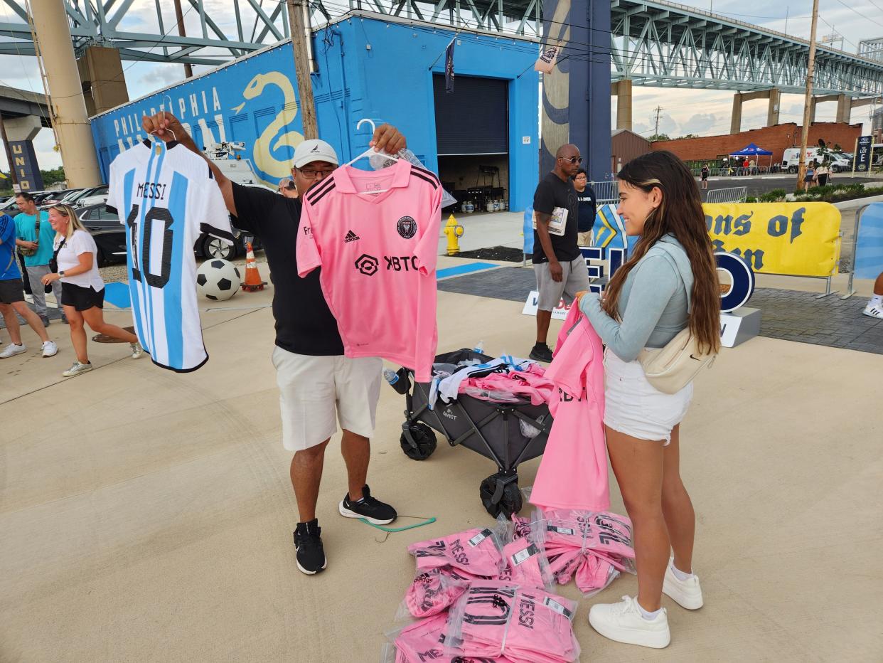 A vendor sells Lionel Messi jerseys outside Subaru Park before Inter Miami played Philadelphia Union on Tuesday, Aug. 15, 2023.