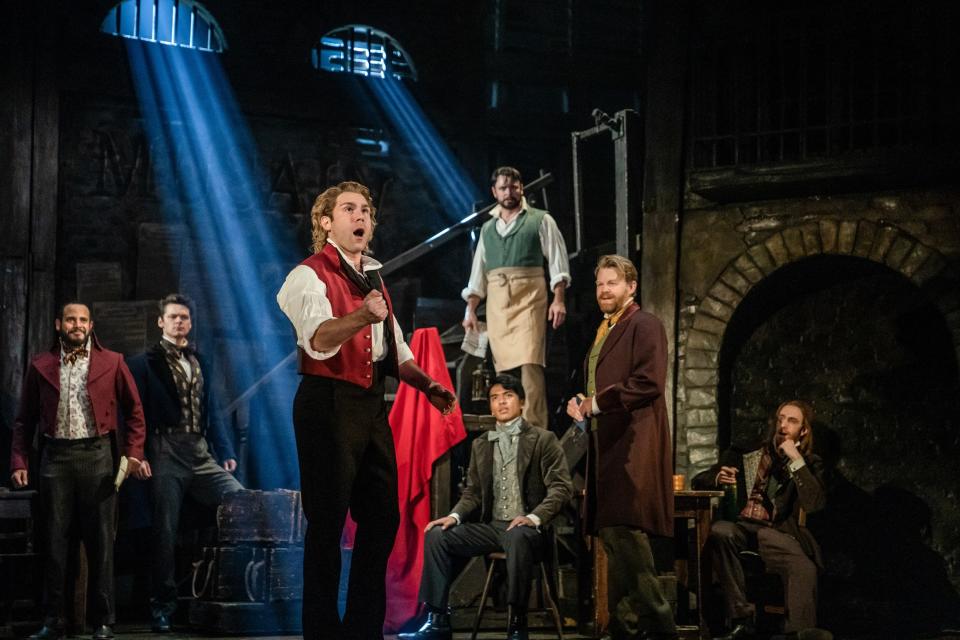 Devin Archer, center, plays Enjolras as the U.S. touring company of "Les Misérables" performs "Red and Black."