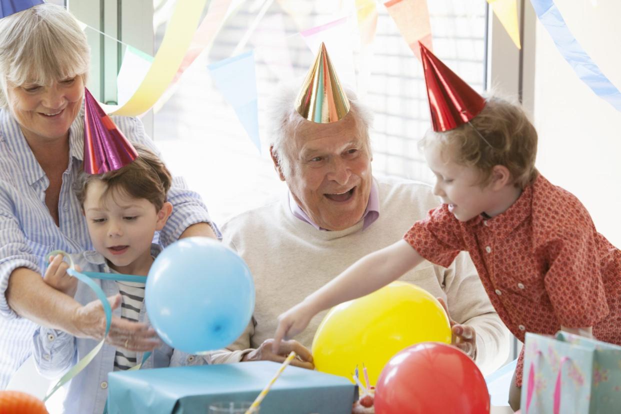 Grandfather with Children on Birthday