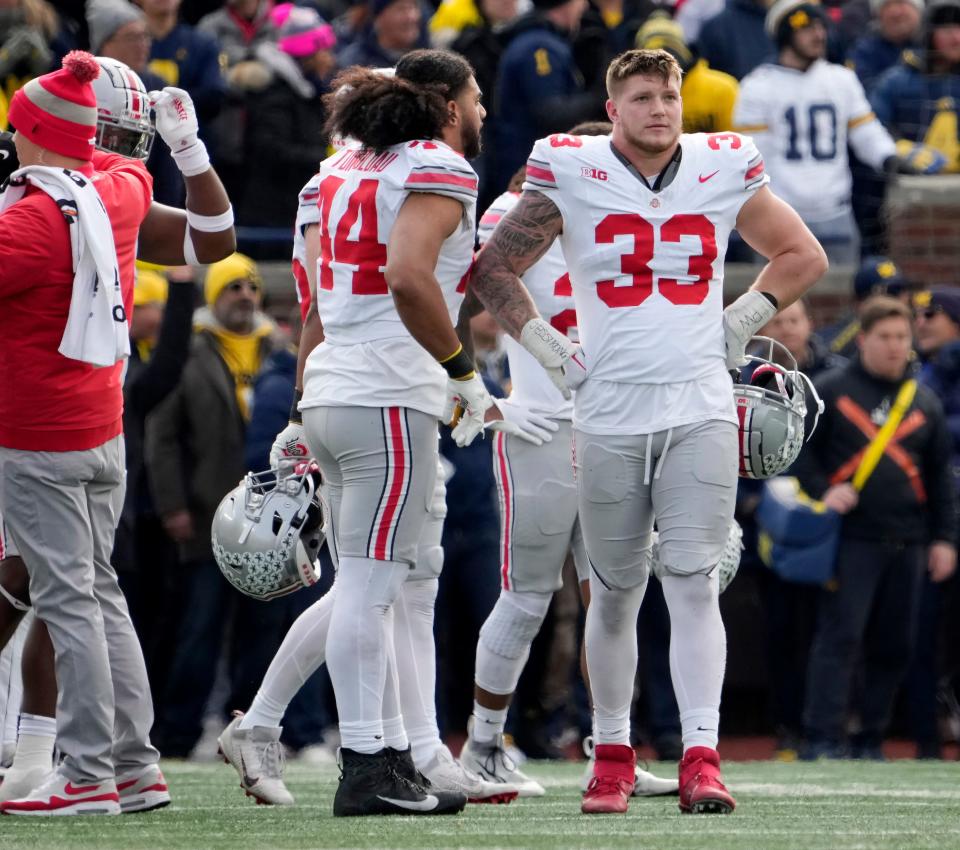 Nov. 25, 2023; Ann Arbor, Mi., USA;
Ohio State Buckeyes defensive end Jack Sawyer (33) waits for the results of a play under review during the first half of Saturday's NCAA Division I football game against the Michigan Wolverines at Michigan Stadium.