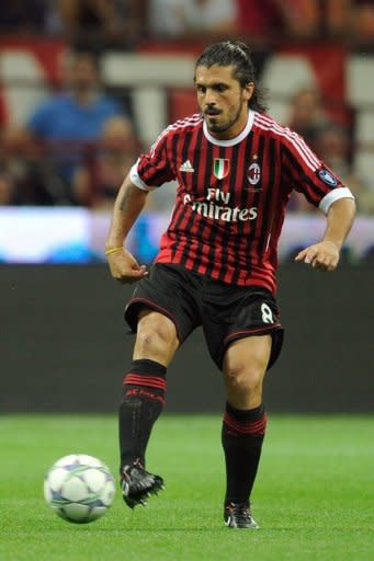 AC Milan's midfielder Gennaro Ivan Gattuso passes the ball during the Trophee Luigi Berlusconi match AC Milan against Juventus, in August 2011, at San Siro stadium in Milan. Gattuso, Filippo Inzaghi and Alessandro Nesta will end their AC Milan careers against Novara on Sunday as the end of an era is all but completed at the San Siro