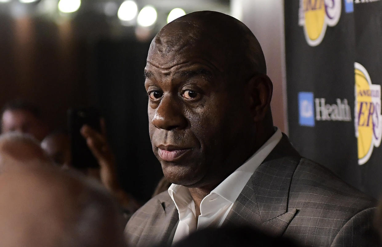 NBA media and fans alike were stunned Tuesday at Magic Johnson's abrupt resignation from the Lakers. (AP)