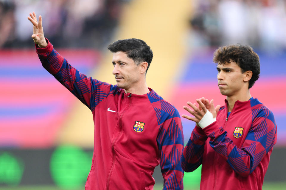 Robert Lewandowski and Joao Felix. (David Ramos/Getty Images)