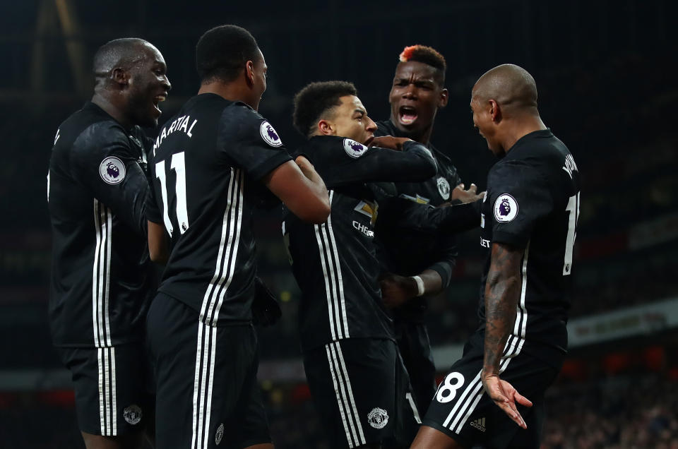 Brilliant in black: Arsenal lost to an impressive Manchester United at Emirates Stadium in December