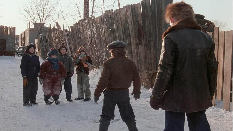 Flick, Randy, Ralphie, and Schwartz face off against Grover Gill and Scut Farkus in this still from "A Christmas Story."
