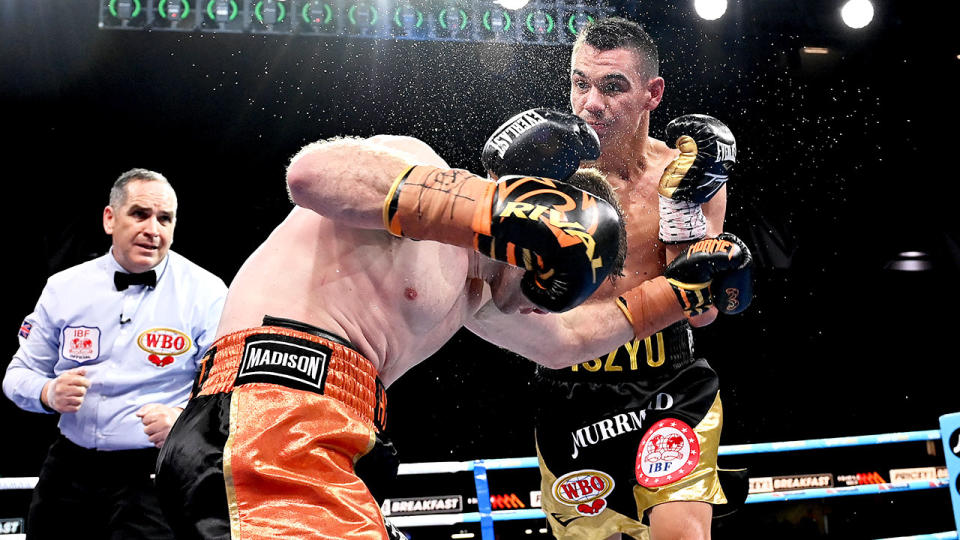 Seen here, Tim Tszyu hits Jeff Horn with a powerful right hand.