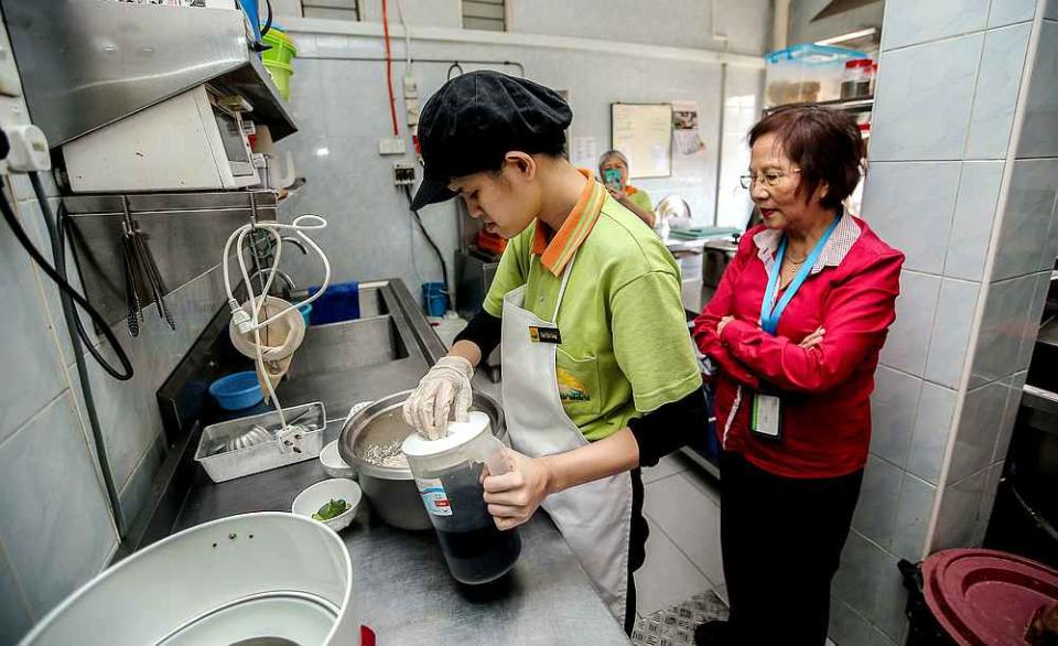 Ray of Hope chairman Datin Mary Lim (right)  says the organisation wants to impart living skills to students who are certified with learning disabilities.  — Picture by Farhan Najib