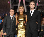 <p>The 20-year-old rising star landed the coveted role of Katniss Everdeen in <i>The Hunger Games</i> series based on the popular YA novels. She appears at the Los Angeles premiere with co-stars Josh Hutcherson and Liam Hemsworth on March 12, 2012. <i>(Photo: Kevin Winter/Getty Images)</i></p>