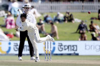 Rachin Ravindra of New Zealand plays on day two of the first cricket test between Bangladesh and New Zealand at Bay Oval in Mount Maunganui, New Zealand, Sunday, Jan. 2, 2022. (Marty Melville/Photosport via AP)