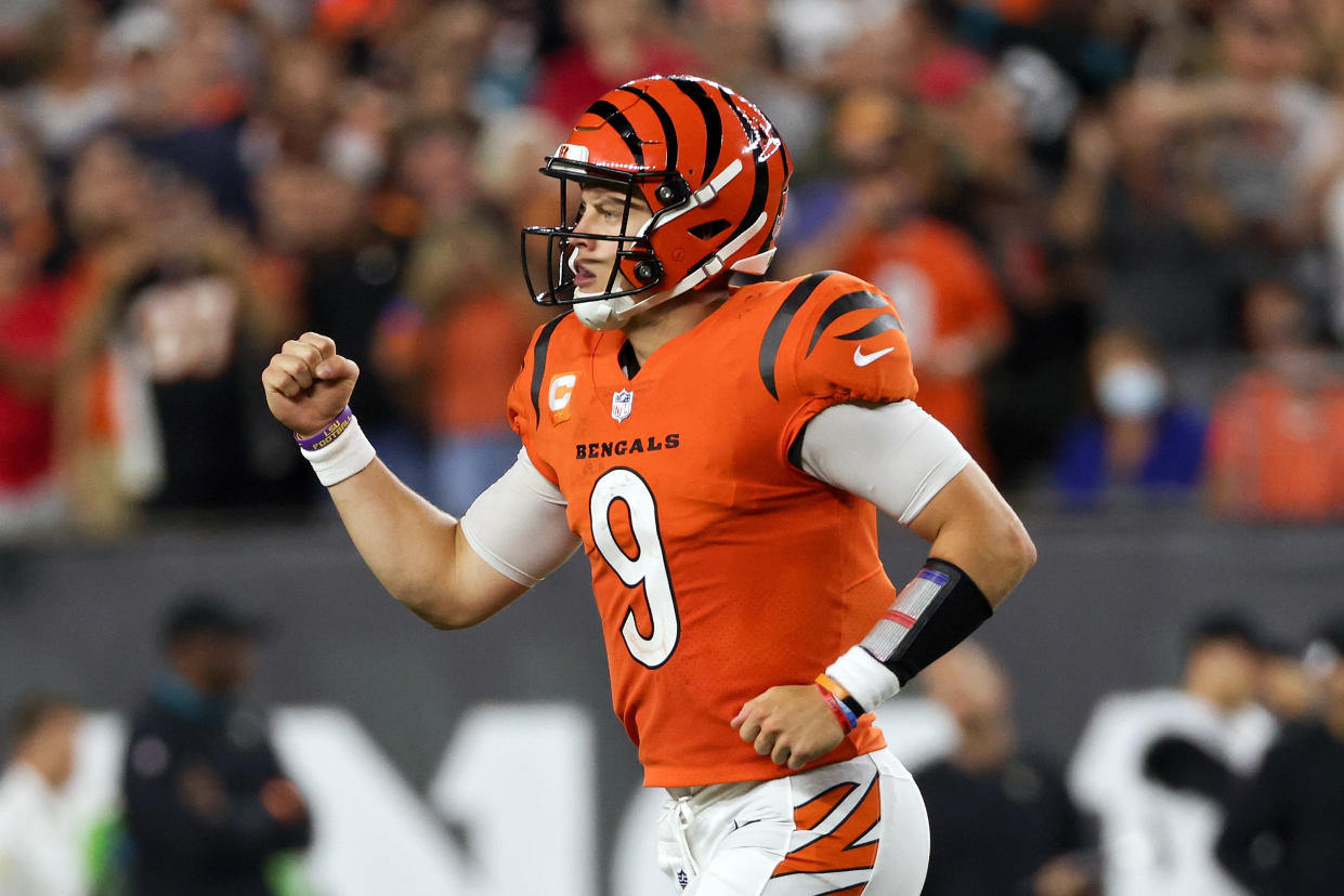 CINCINNATI, OHIO - SEPTEMBER 30: Joe Burrow #9 of the Cincinnati Bengals celebrates after scoring a touchdown in the fourth quarter against the Jacksonville Jaguars at Paul Brown Stadium on September 30, 2021 in Cincinnati, Ohio. (Photo by Dylan Buell/Getty Images)