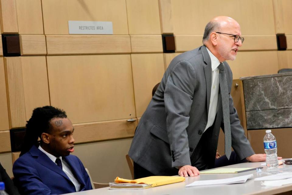 Defense attorney Stuart Adelstein, with Jamell Demons, better known as rapper YNW Melly, at left, gives his closing argument in his trial at the Broward County Courthouse in Fort Lauderdale on Thursday, July 20, 2023. Demons, 22, is accused of killing two fellow rappers and conspiring to make it look like a drive-by shooting in October 2018. (Amy Beth Bennett / South Florida Sun Sentinel)