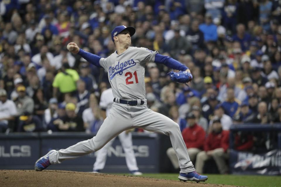 Walker Buehler pitches in the first inning for the Dodgers against the Brewers in the 2018 playoffs.